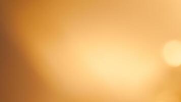 Soft golden bokeh background with a subtle glowing and elegant festive ambiance photo