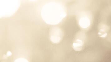 Bright golden bokeh lights create a festive and sparkling holiday ambiance photo