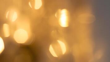 Soft golden bokeh background with a subtle glowing and elegant festive ambiance photo