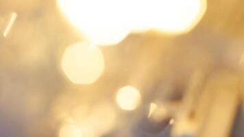 Soft golden bokeh background with a subtle glowing and elegant festive ambiance photo