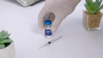 A doctor who has Preparing a Disease Vaccine in hospital video