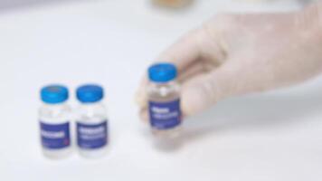 Mpox Vaccine Vial in Gloved Hand Prevention, Healthcare, and Public Health video
