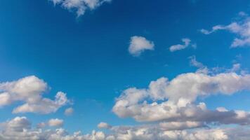 Motion of the clouds with clear blue sky timelapse 4k . Partly cloudy sky background time lapse footage. video