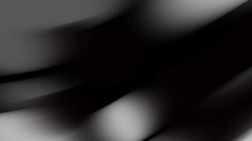 Black and white fade background with smooth, diagonal streaks of light and shadow creating a dynamic, flowing effect. The soft transitions and high contrast evoke a sense of depth and motion. video