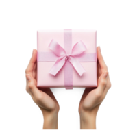 Hands hoding pink gift box top view isolate on transparent background png