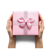 Hands hoding pink gift box top view isolate on transparent background png