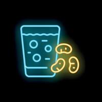 Neon sign of a glass of beer and peanuts representing a bar concept vector