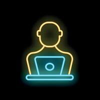 Neon sign of a person working on laptop computer icon vector