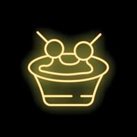 Neon sign showing a cocktail glass with olives and a straw glowing yellow on a black background vector