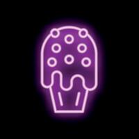 Neon sign of a cupcake dripping with icing on black background vector