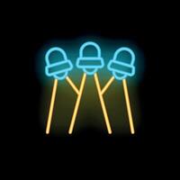 Neon sign showing three bells glowing on black background vector