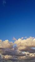 Rugged clouds are drifting across the lower half of the horizon in an amazing scene video
