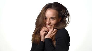 Happy cheerful young woman. Woman looking at camera with joyful and charming smile video