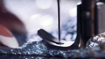 Sewing machine with fabric and thread video