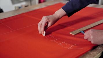 Seamstress working with pattern video