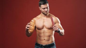 Difficult choice between sport and junk food. Unhealthy eating diet on dark red background video