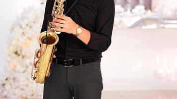 Man play on axophone with microphone video
