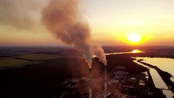Aerial view of pipes with smoke. Factory with smoke coming out of chimneys video