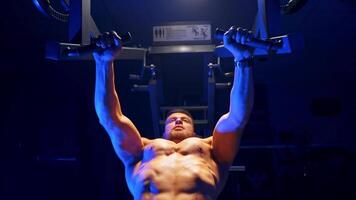 Bodybuilder working out in gym. Bodybuilder working out in gym video