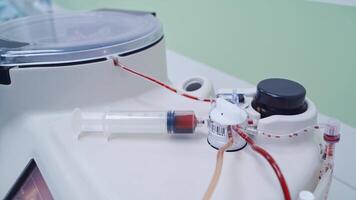 Procedure of stem cells injection. Scientist with equipment and science experiments video