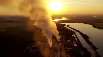 Old smokestack of factory. Pollution and smoke from chimneys of factory video