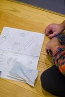 man furniture assembly instructions and laid on the floor side, top view. High quality photo