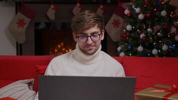 Guy chatting in social network, typing message, internet web surfing. video