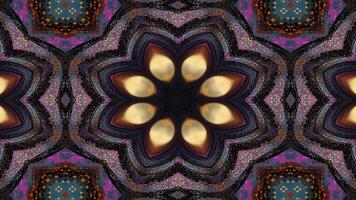 A vibrant kaleidoscopic pattern resembling a flower, with intricate designs and colors. video