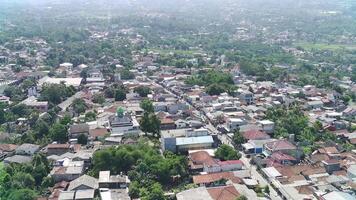 Aerial view of a city with many houses and trees video