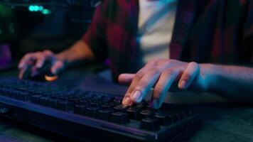 Arabian Indian Latino American man male guy keyboard typing achievement goal computer streamer gamer programmer player technology cyber sport esport finish play game online gambling relax home video