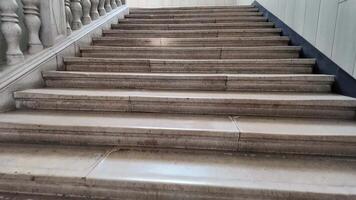 Elegant stone staircase leading upward, symbolizing progress and ambition in architectural design video