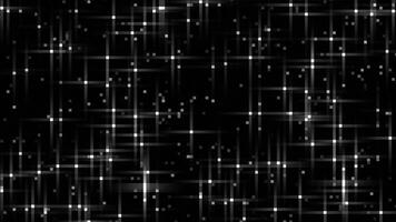 white color appearing and disappearing glowing shiny stars and glitters on black background video