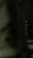 Engaging in a strategic chess game that features abstract pieces with a notable focus video