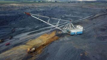 An Aerial View of Large Mining Equipment Operated in an OpenPit Mine Environment. Stock Clip video