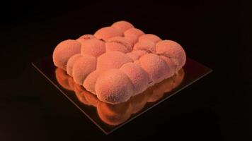 Cake pops in two on the table in stop motion video