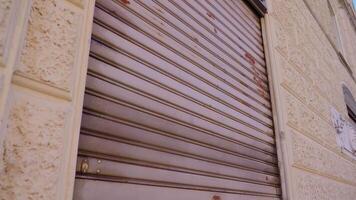 Closed shutter of a large building window video