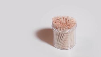 Heap of toothpicks in the container on the table video
