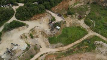 Aerial view of an abandoned mining quarry in Germany im Landkreis Dillingen. Open pit mines drone view. Steinbruch Luftaufnahme in Deutschland, Bayern in der Stadt Haunsheim. Mining equipment. video