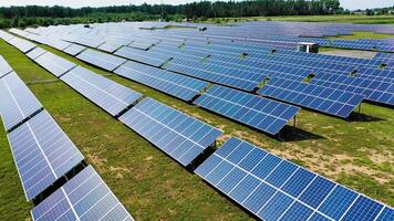 Solar panels in aerial view. Source of energy to generate electricity creating sustainable energy video