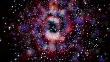 a bright galaxy made of billions of particles glows with neon and moves in space video
