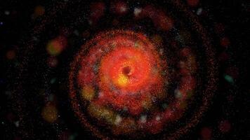 a bright galaxy made of billions of particles glows with neon and moves in space video