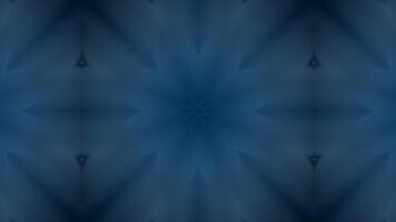 A symmetrical abstract design featuring shades of blue, creating a kaleidoscopic effect. video
