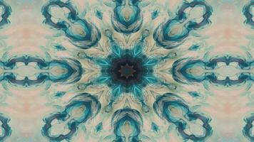 A vibrant, symmetrical abstract design featuring intricate patterns and warm colors. video