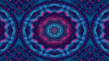 A vibrant, symmetrical kaleidoscope pattern with blue and red hues creating a mesmerizing effect. video