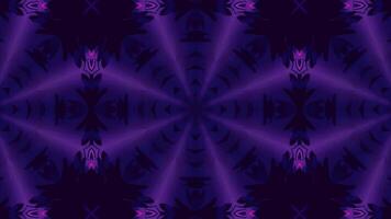A symmetrical, kaleidoscopic pattern featuring vibrant colors and abstract shapes. video