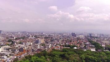 Aerial Shot Footage Slum area in the center of Bandung City, Indonesia. One of the most densely populated areas in Asia. Urban cityscape. Overpopulated City video