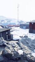 antarctic base set in a natural harbor in front of the Antarctic Peninsula video