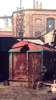 Rusted Out Building Next to Tall Brick Structure, vertical video
