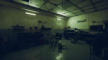 A dimly lit abandoned laboratory with scattered debris and empty tables video