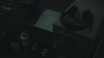 Dark workspace with tools and masks during late night hours video